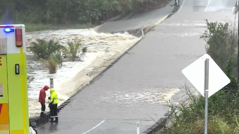 South-East Queensland hit with sudden downpour
