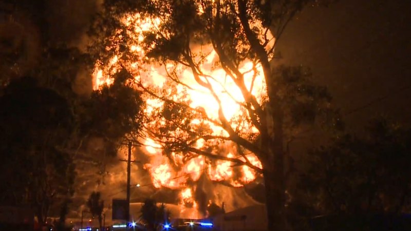 Firefighters battle massive factory inferno