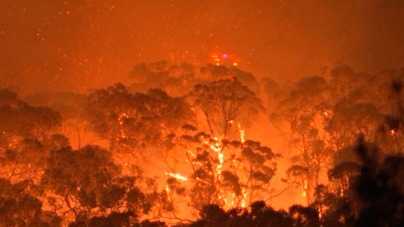 Warning as out-of-control bushfire burns near homes in Melbourne’s east