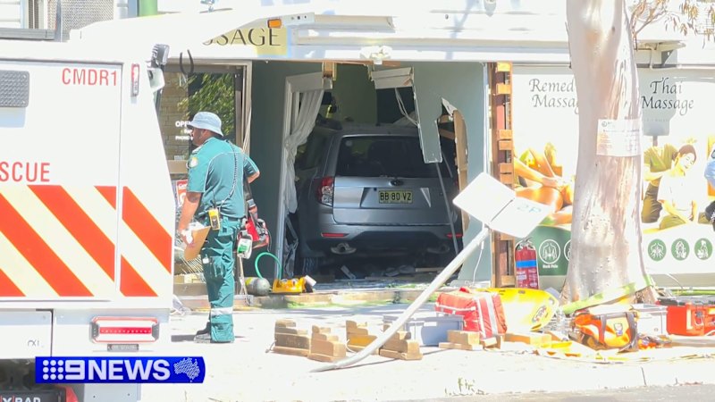Five injured after car ploughs through Canberra massage parlour