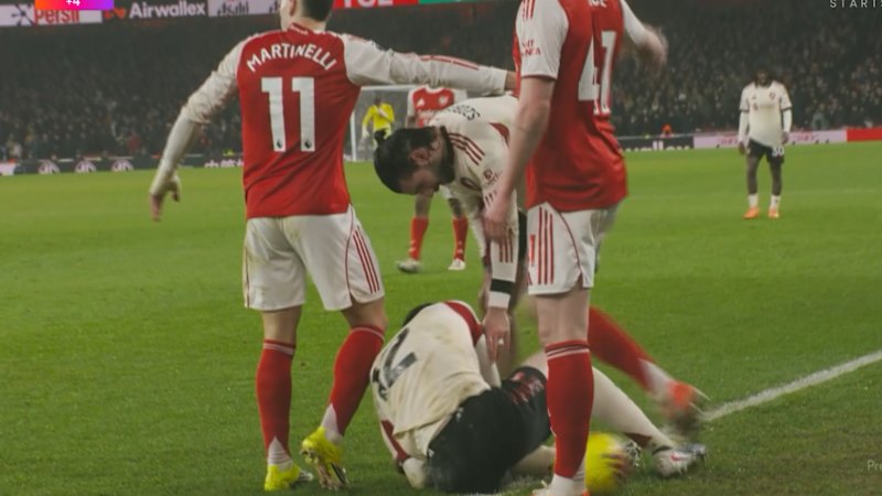 Arsenal player shoves injured rival