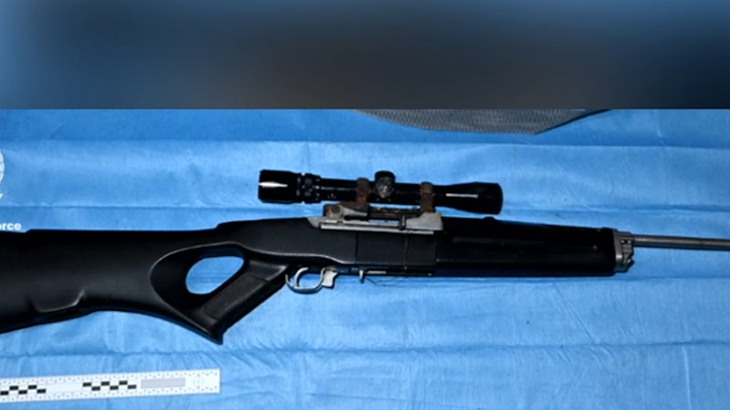 Man charged after weapons, cash and thousands of rounds of ammo seized