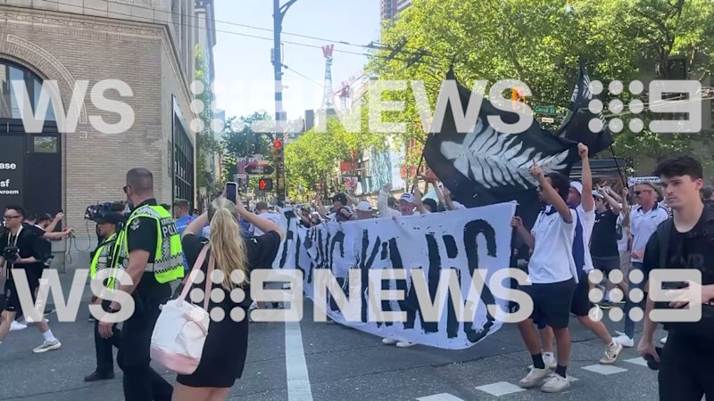 Kiwi fans march through the streets
