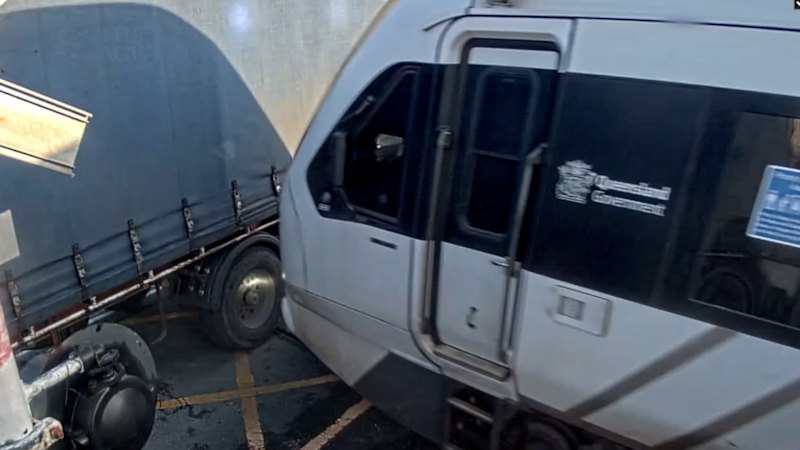 A Queensland Rail train crashing into a truck in Brisbane in August 2025