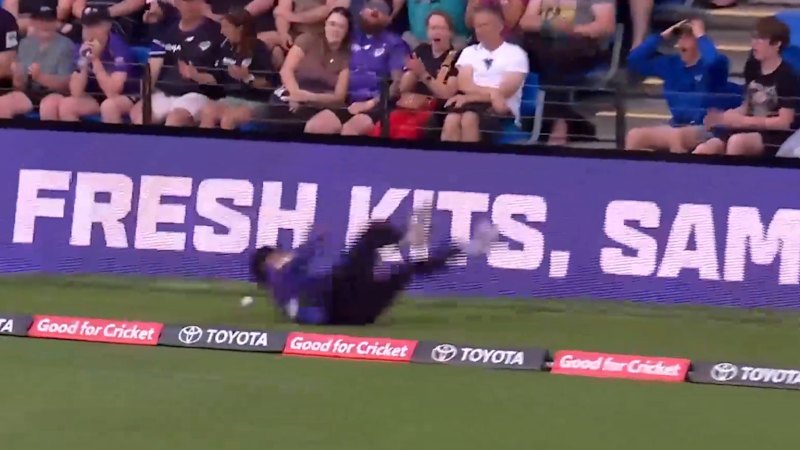 Chaudhary clutches shoulder after dropped catch