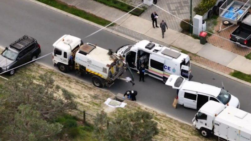 Woman assisting police after baby found in drain