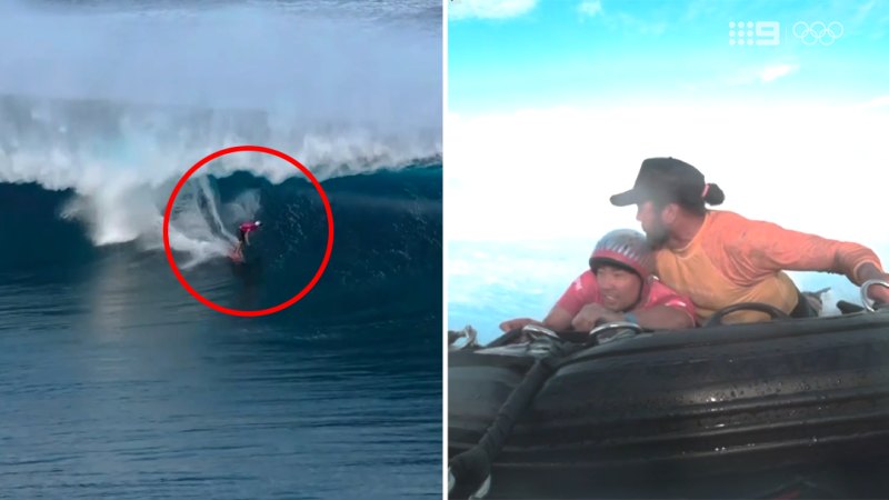 Surfer's board snaps in half under strong wave
