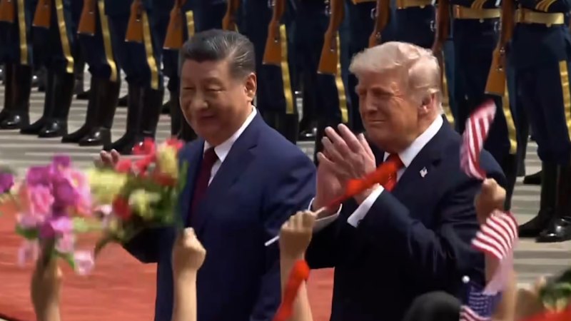 Xi greets Trump at Beijing welcome ceremony