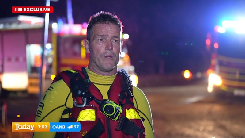 Queensland authorities make daring floodwater rescue
