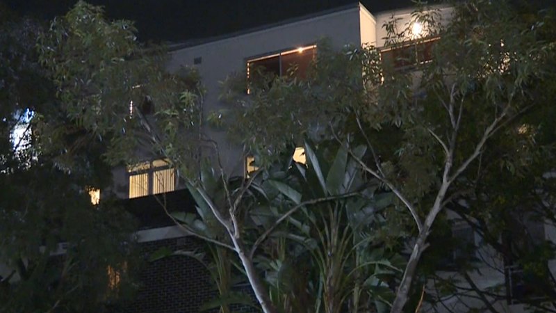 Man dies after falling from Sydney unit block