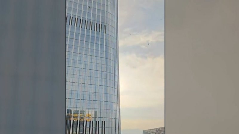Light plane crashes into Beijing’s tallest building