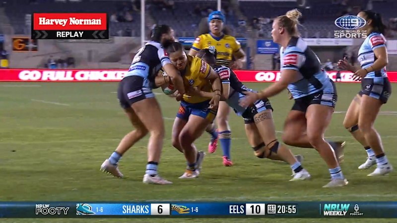 Martha Mataele beats three defenders to score for the Eels