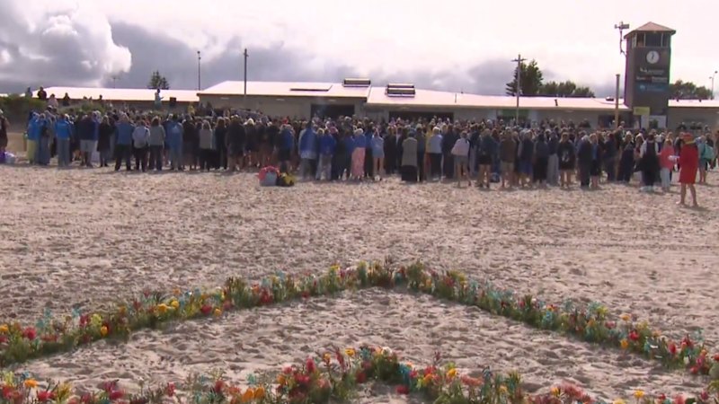 Tribute held for Perth shark attack victim