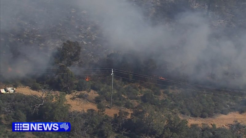 Out-of-control blaze threatens homes in Perth Hills