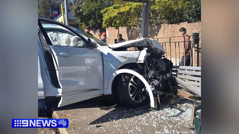 Police hunt driver after pedestrian hit at Sydney bus stop