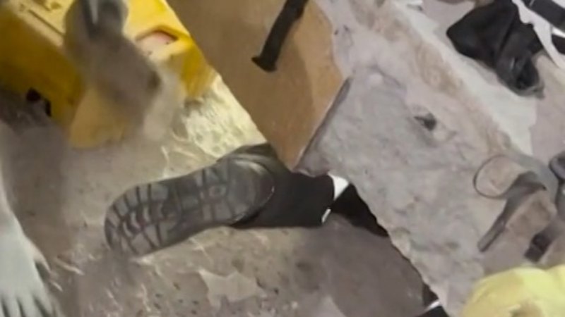 Woman pulled from earthquake rubble