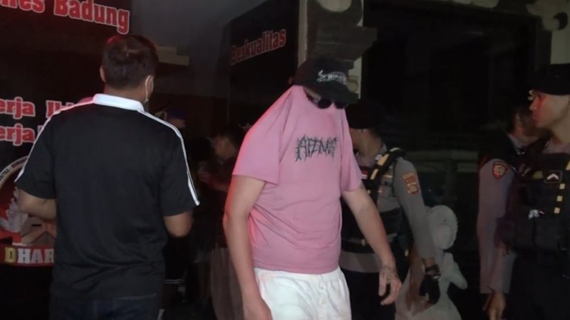 Fourteen Australians arrested in Bali in raid involving controversial creator