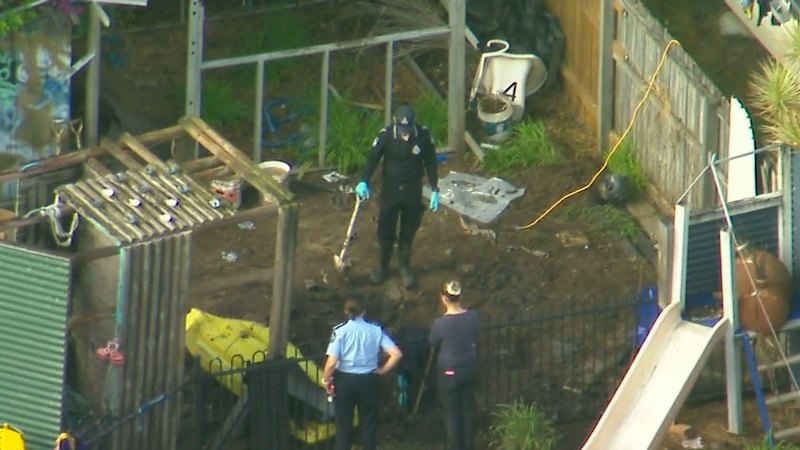 Human remains found on remote property, two charged over cold case