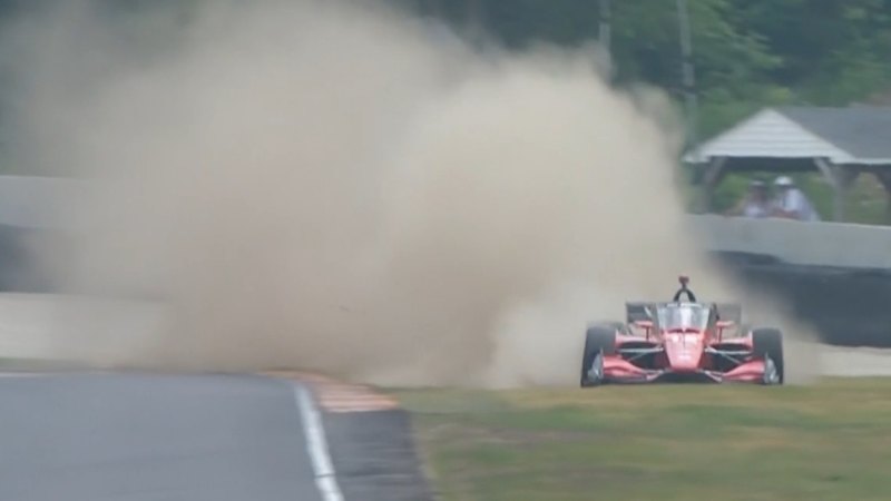 Grosjean forces Power off the road