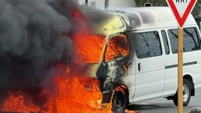 Bunnings staff help after van bursts into flames in Perth