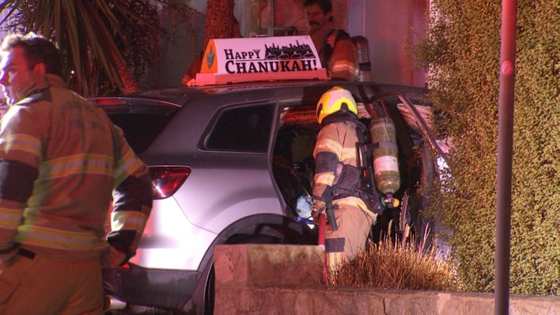 Car with Hanukkah sign firebombed on Christmas morning