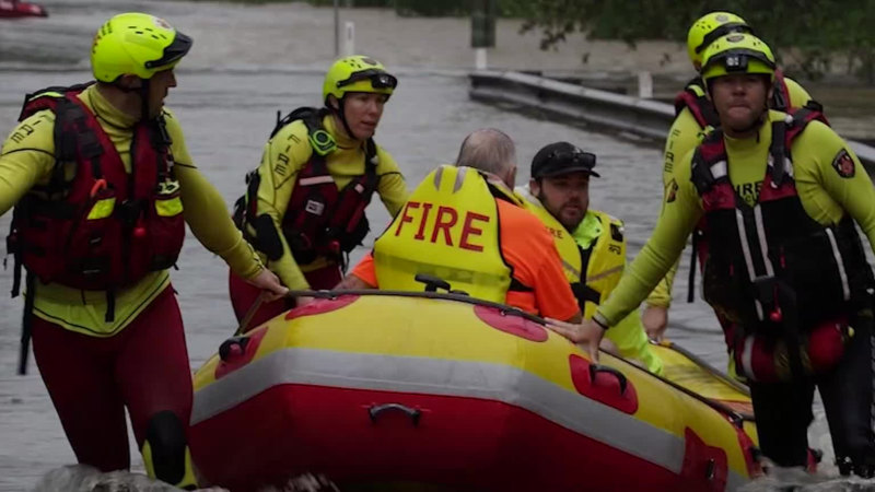 South-east Queensland on high alert after Brisbane’s wettest day in half a century