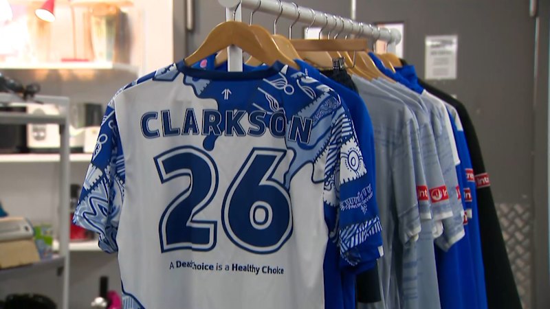 Alastair Clarkson donates North Melbourne apparel to Vinnies op-shop