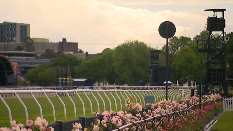 Thousands prepare for a wet and wild Melbourne Cup day