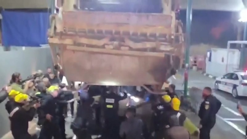 Israeli forces discover 70 men hiding in garbage truck