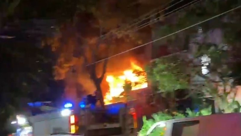 Suspicious fire tears through apartment complex