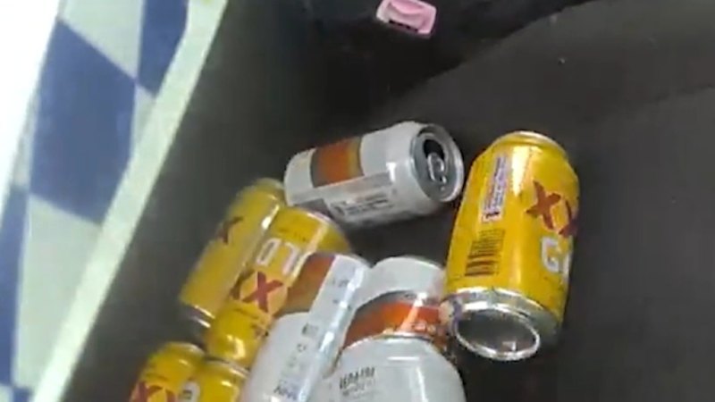 Police find empty beer cans in alleged drunk driver's car