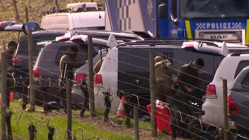 Hunt for accused cop killer enters sixth day