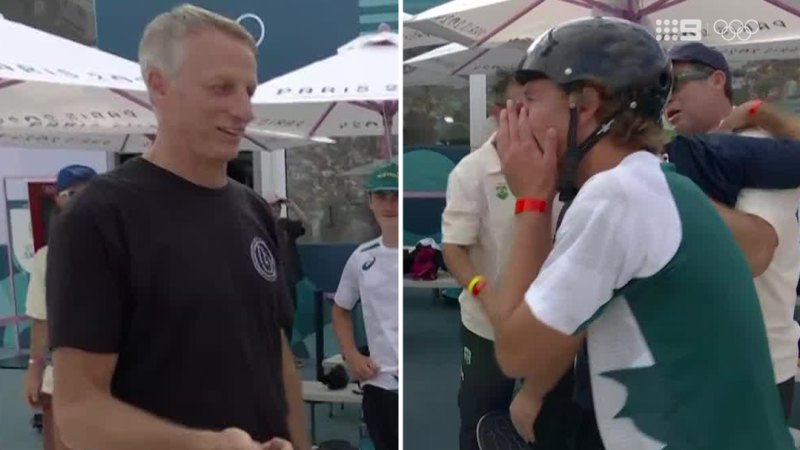 Tony Hawk congratulates Keegan Palmer on park skateboarding gold