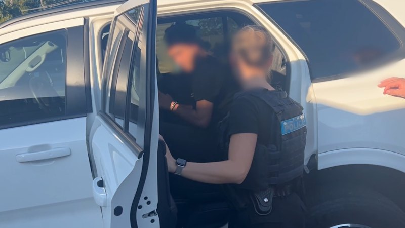 Queensland man charged with bribing officials over woman's death