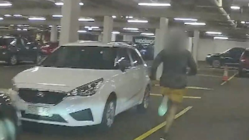 Dashcam footage shows police chasing man through shopping centre car park
