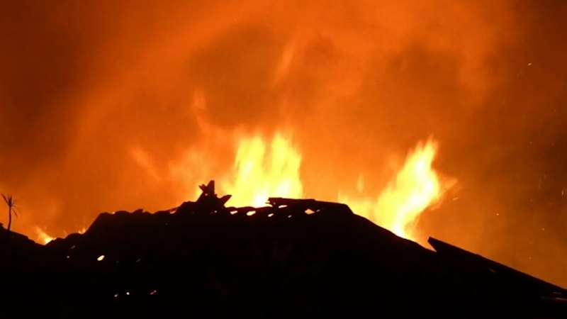 Neighbours hailed for helping survivors escape suspected arson Gold Coast house fire