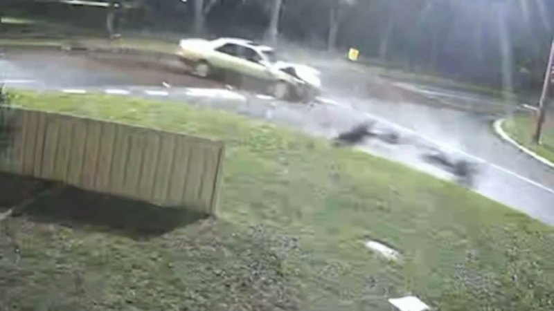 Dirt bike hits Camry in dramatic collision caught on CCTV