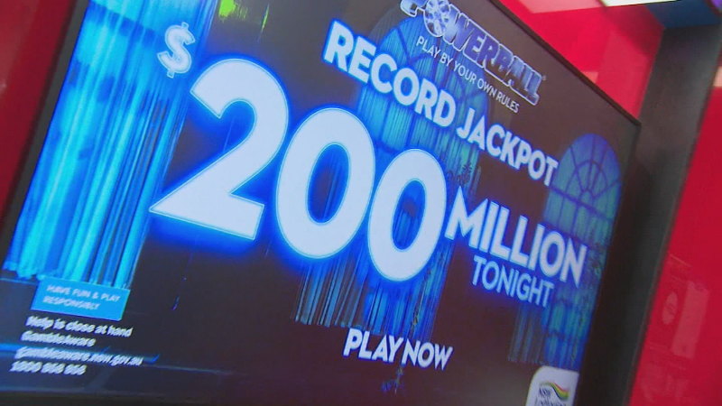 Two winning tickets have shared the record $200 million Powerball jackpot