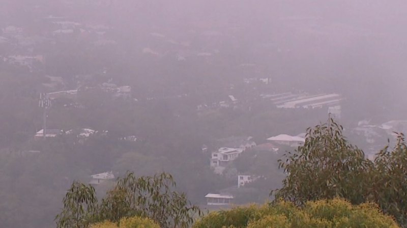 Heavy rain sparks flash flooding across south-east Queensland