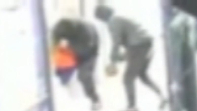 Moment Adelaide barbershop firebombed