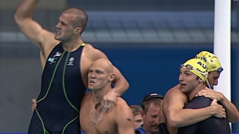 Aussies celebrate relay gold with air guitars