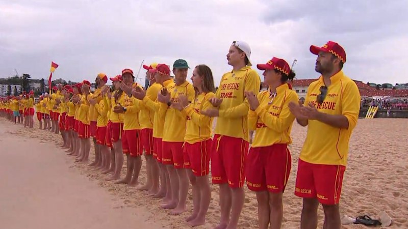 Surf lifesavers show powerful display of strength on Bondi Beach