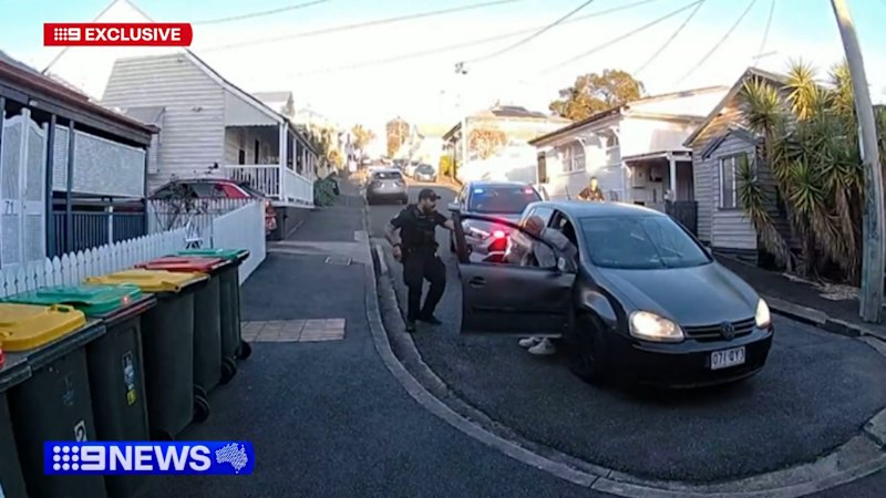 Driver arrested after allegedly ramming police car and crashing into home
