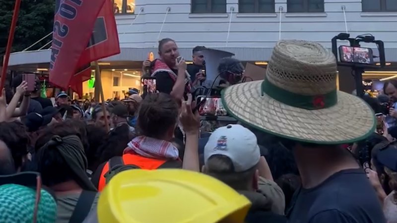 Josh Lees addresses the crowd at Town Hall