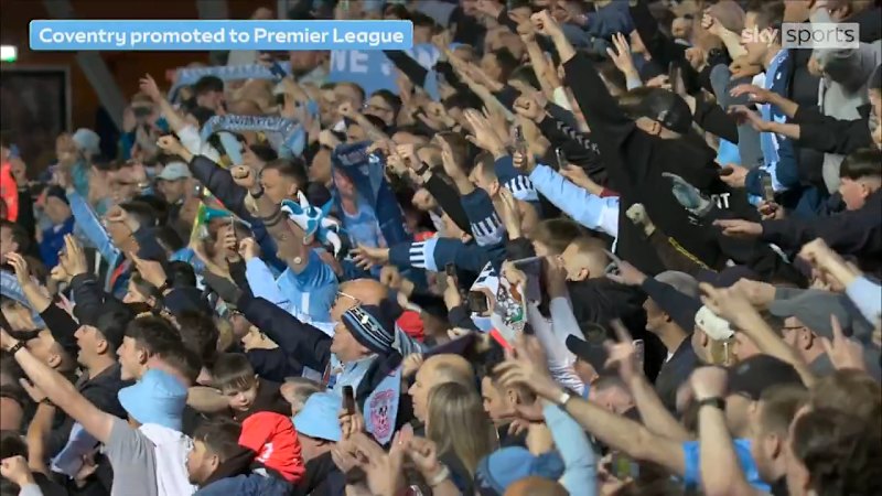 Crowds of fans cheer for Coventry's return to Premier League