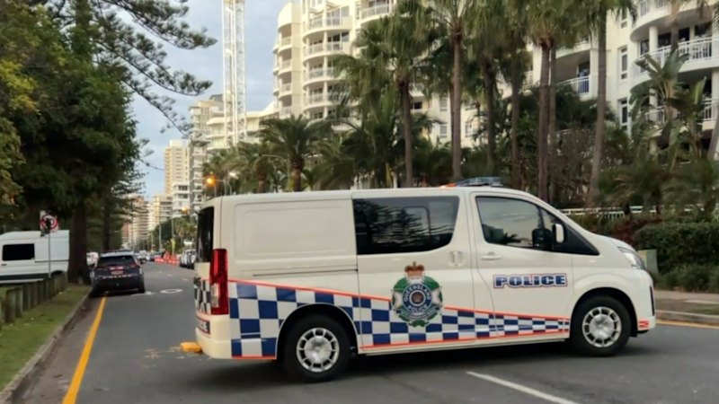 Streets shut down after man climbs crane on Gold Coast
