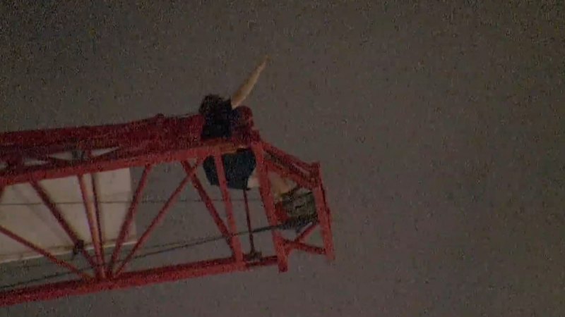 Teen arrested after climbing crane, refusing to come down