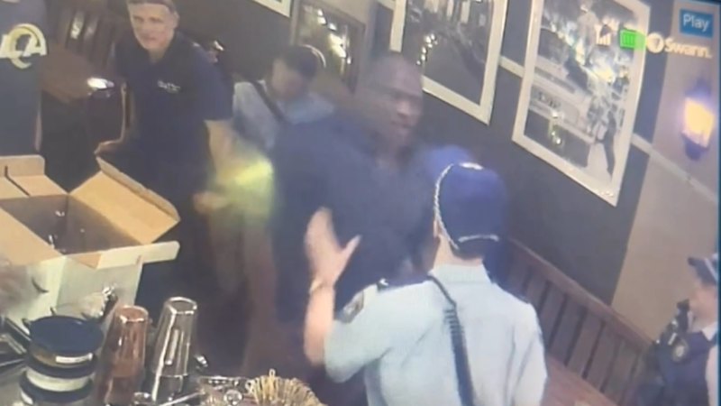 Nine cops called in to take down 'hostile' NRL legend