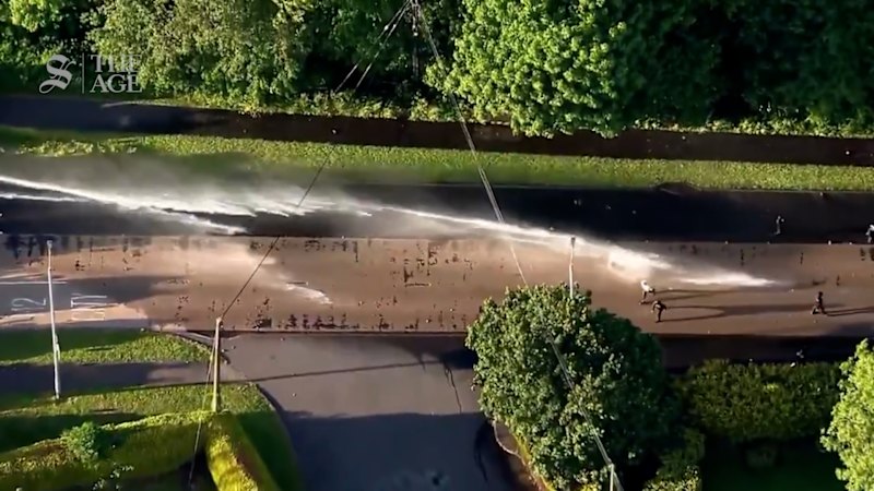 Police unleash water cannon on protesters near Bel