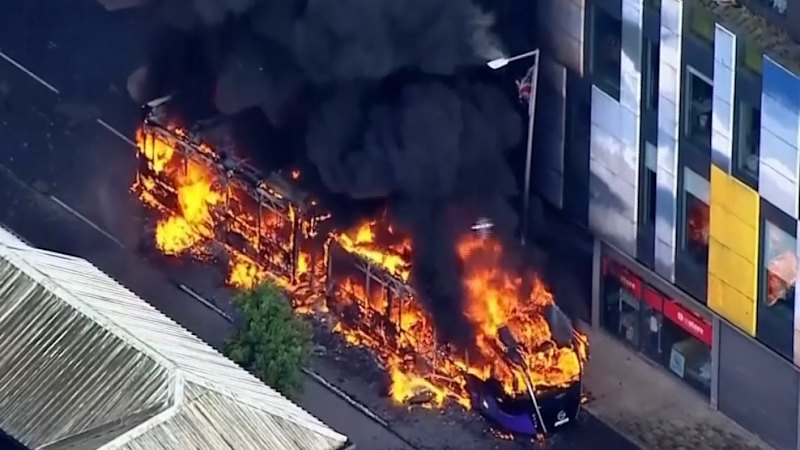 Bus set alight in Belfast during riots after a sta
